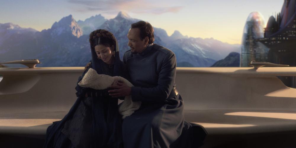 Breha and Bail Organa holding the infant Leia at the end of Revenge of the Sith