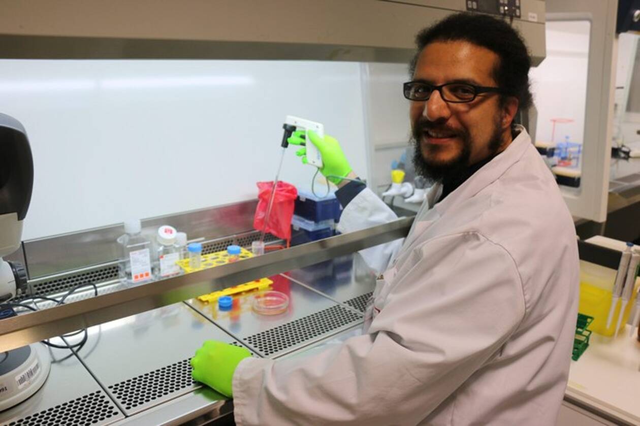 Dr. Karim Si-Tayeb in the biology lab
